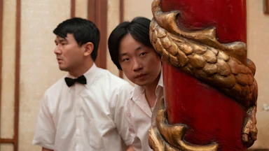 Fatty Choi (Ronny Chieng) and Willis Wu (Jimmy O. Yang star in Hulu's new series “Interior Chinatown,” where a Chinatown waiter finds himself in a mystery.