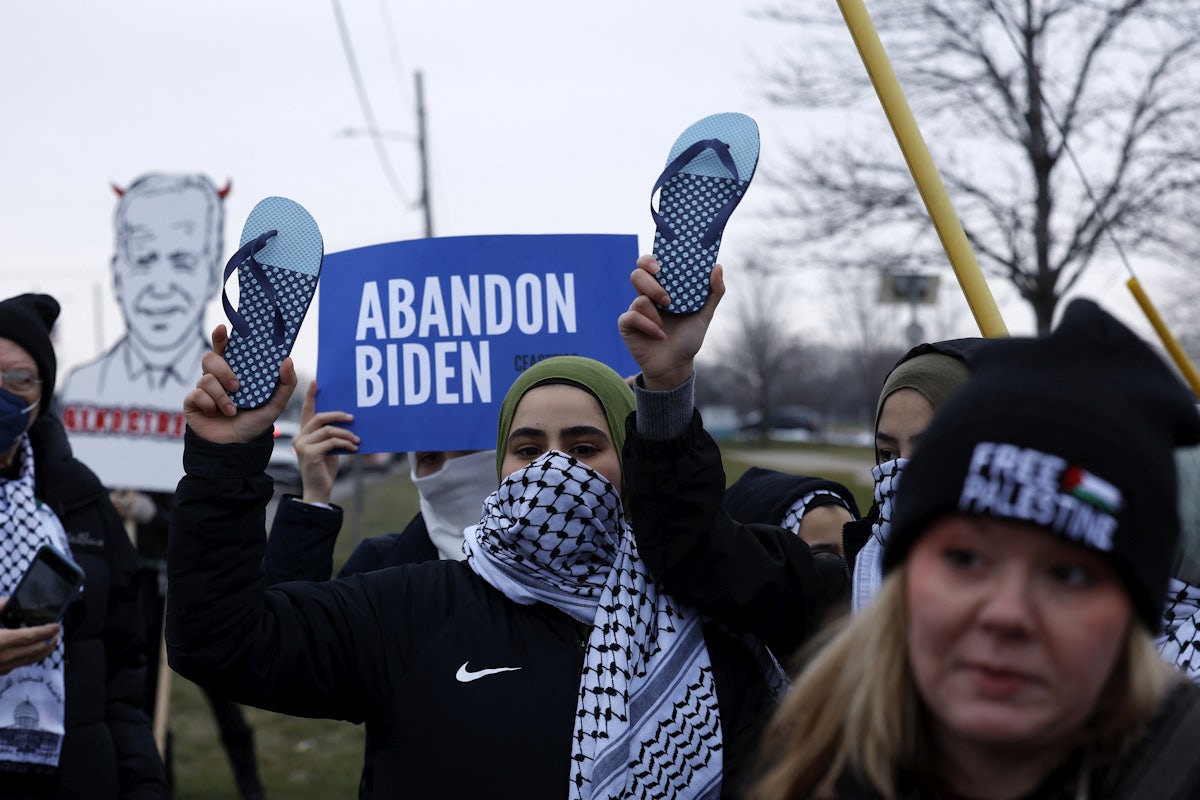 People gather in support of Palestinians outside of the venue where President Joe Biden is speaking to members of the United Auto Workers in Michigan.