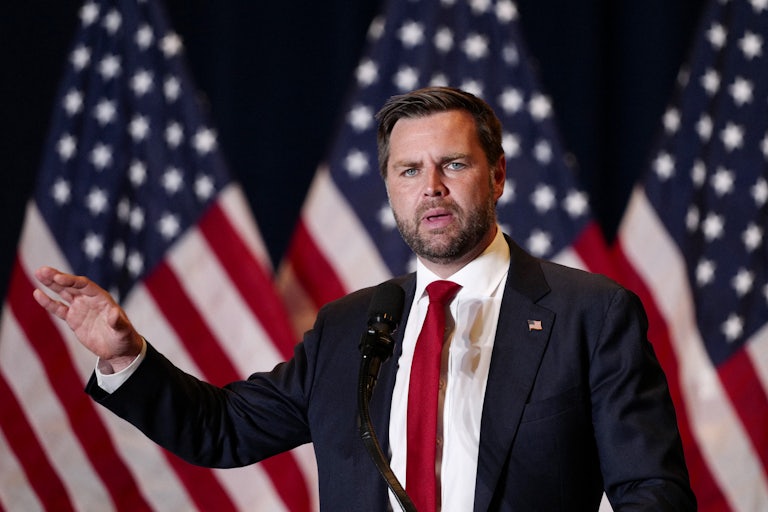 J.D. Vance gestures while speaking at a Donald Trump campaign event