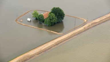 A manmade levee around a home in the Mississippi Delta 
