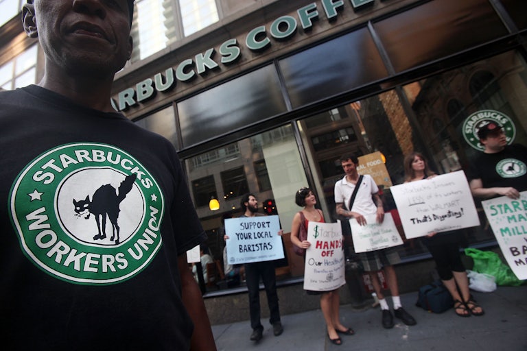 Starbucks baristas and supporters protest
