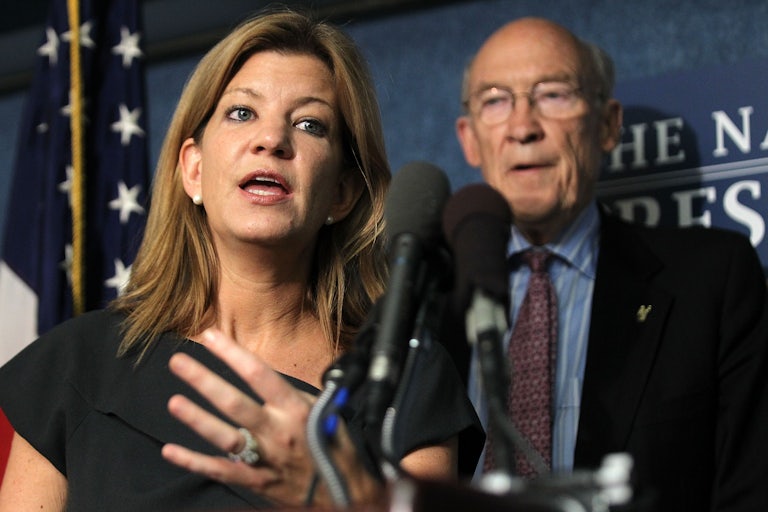 CRFB head Maya MacGuineas and former Sen. Alan Simpson speak at a press conference.