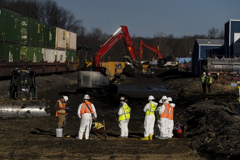 Ohio EPA and EPA contractors collect soil and air samples from the derailment site on March 9 in East Palestine, Ohio.