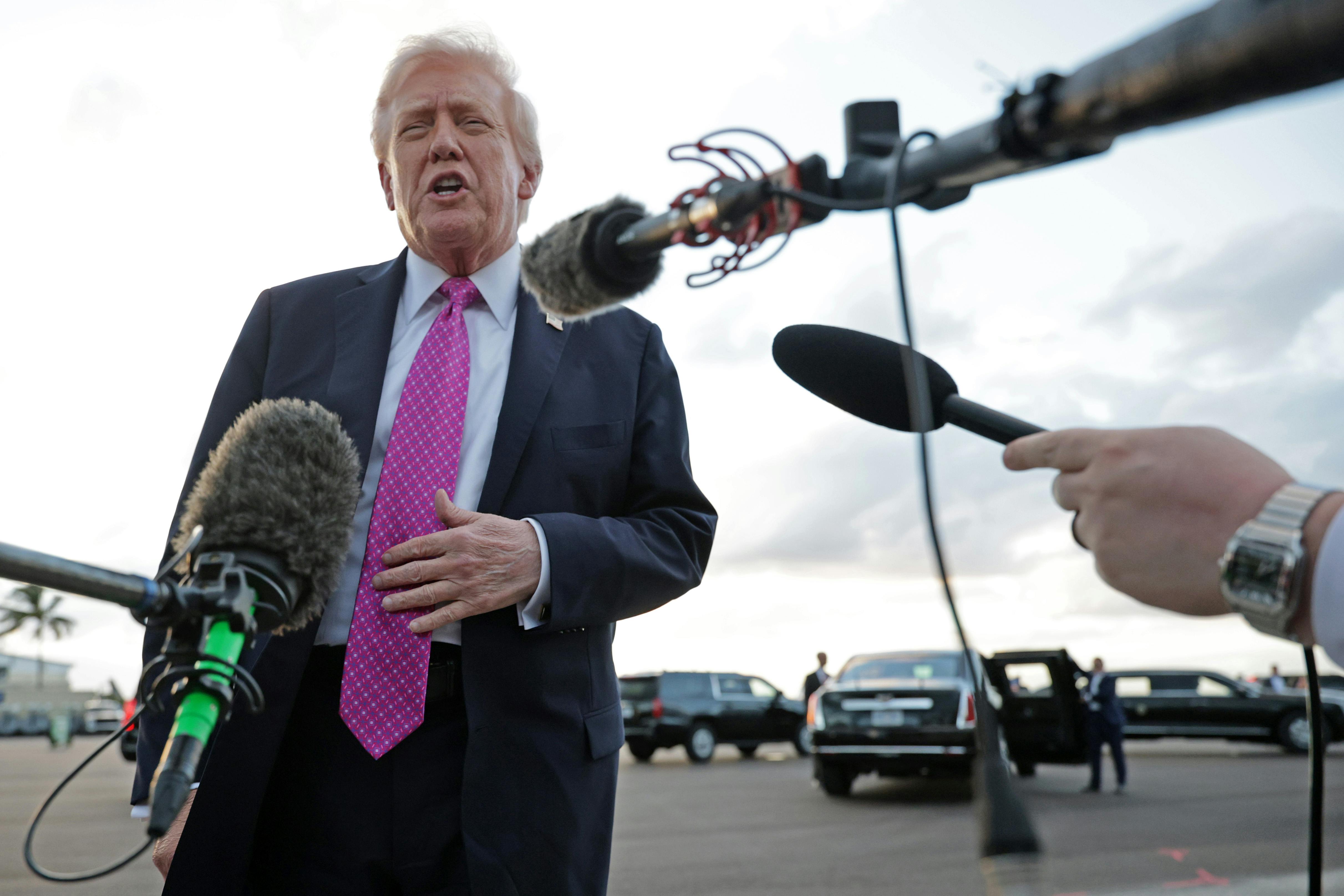 Donald Trump speaks to reporters