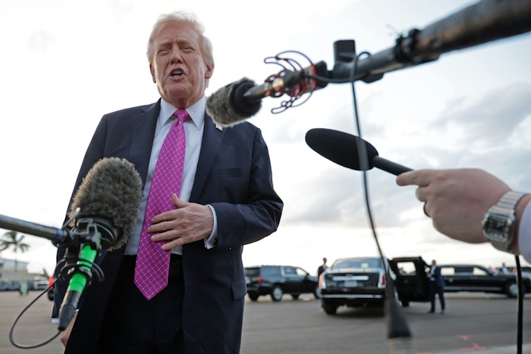 Donald Trump speaks to reporters