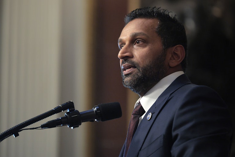 FBI director Kash Patel speaks at a mic