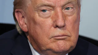 Donald Trump frowns