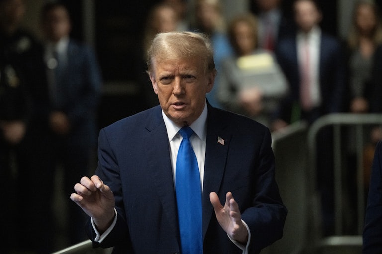 Donald Trump gestures as he speaks