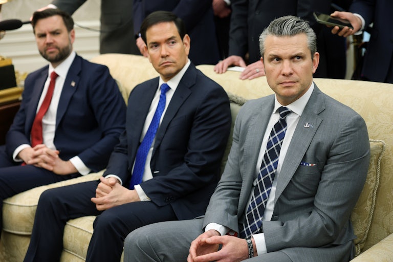 Vice President JD Vance, Secretary of State Marco Rubio, and Defense Secretary Pete Hegseth sit next to each other on a couch in the Oval Office