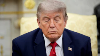 Donald Trump looks downcast