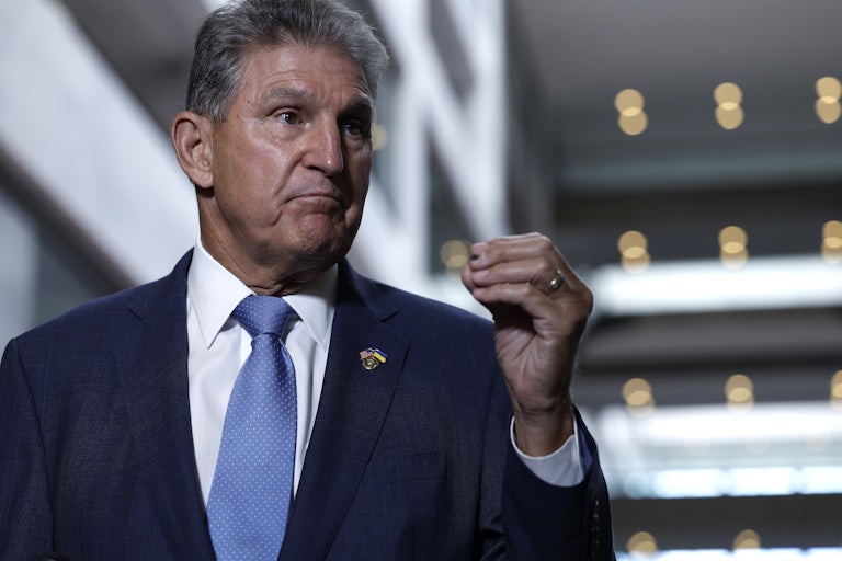 West Virginia Senator Joe Manchin speaks to reporters about the Inflation Reduction Act.