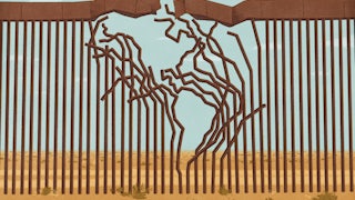 An illustration of a hole in the border wall, and the hole forms the shape of North and South America, symbolizing the fraught relationship between the countries in the Americas