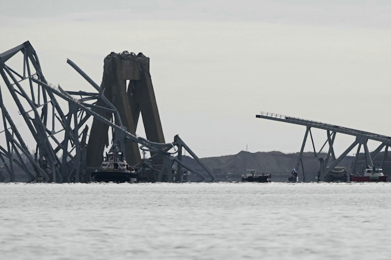 The steel frame of the Francis Scott Key Bridge in Baltimore, Maryland, lies in the water after it collapsed