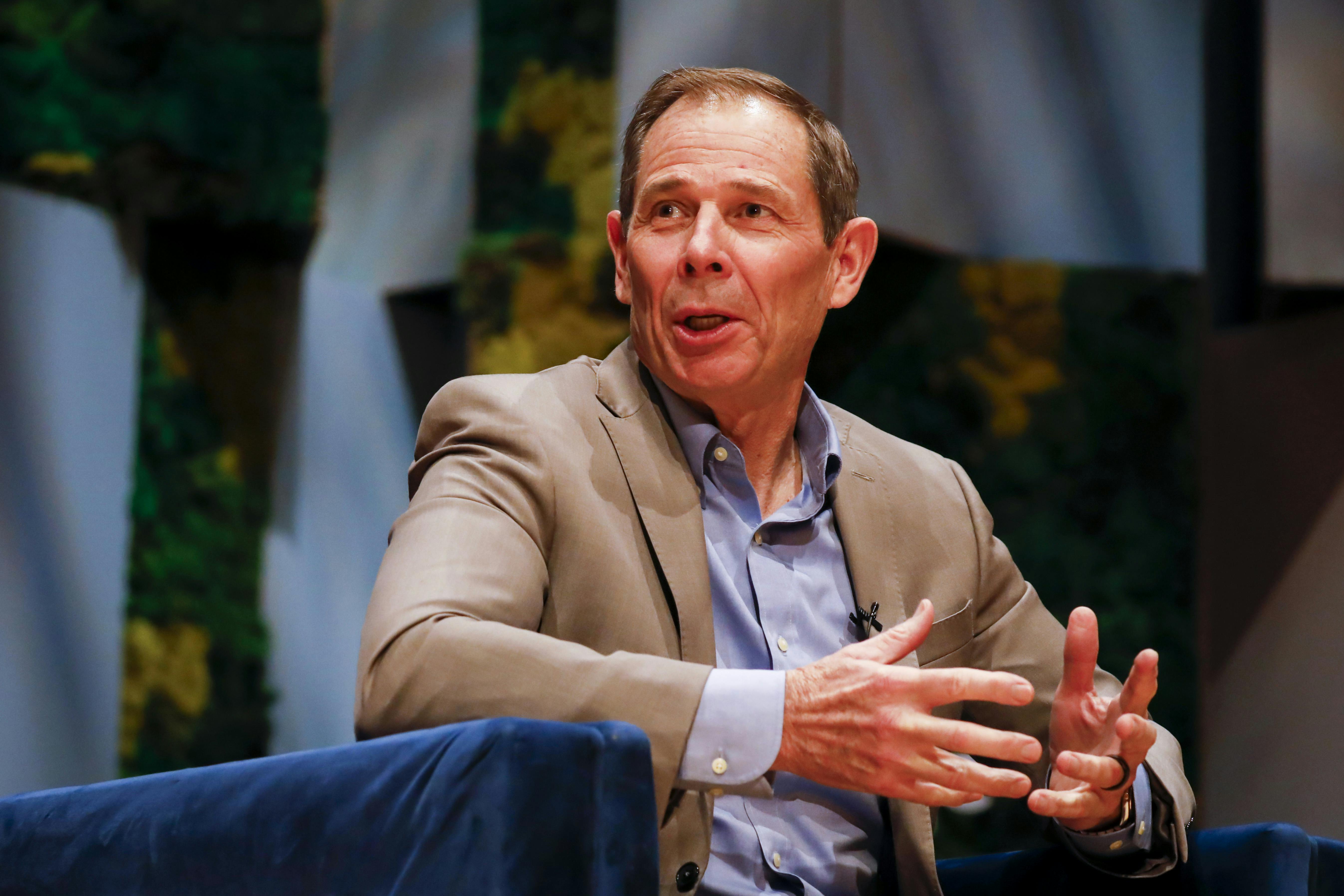 John Curtis talks while seated.