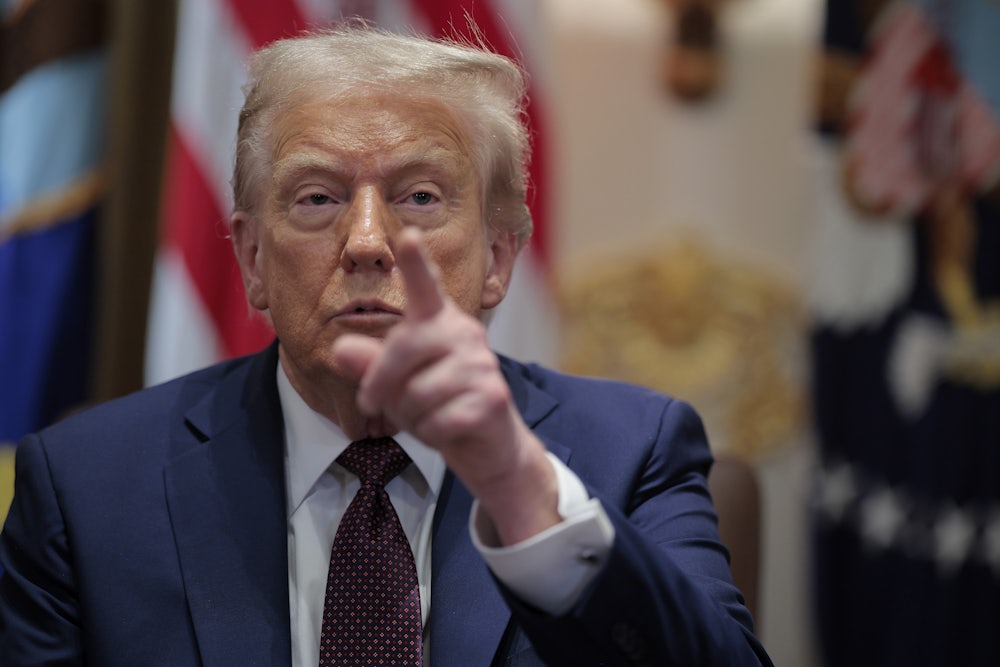 Donald Trump calls on a reporter during a cabinet meeting with members of his administration in the Cabinet Room of the White House.