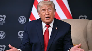 Donald Trump spreads his hands, looking puzzled