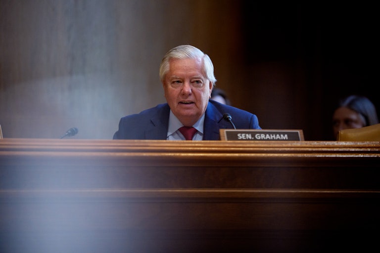 Lindsey Graham sits at the dais during a Senate hearing