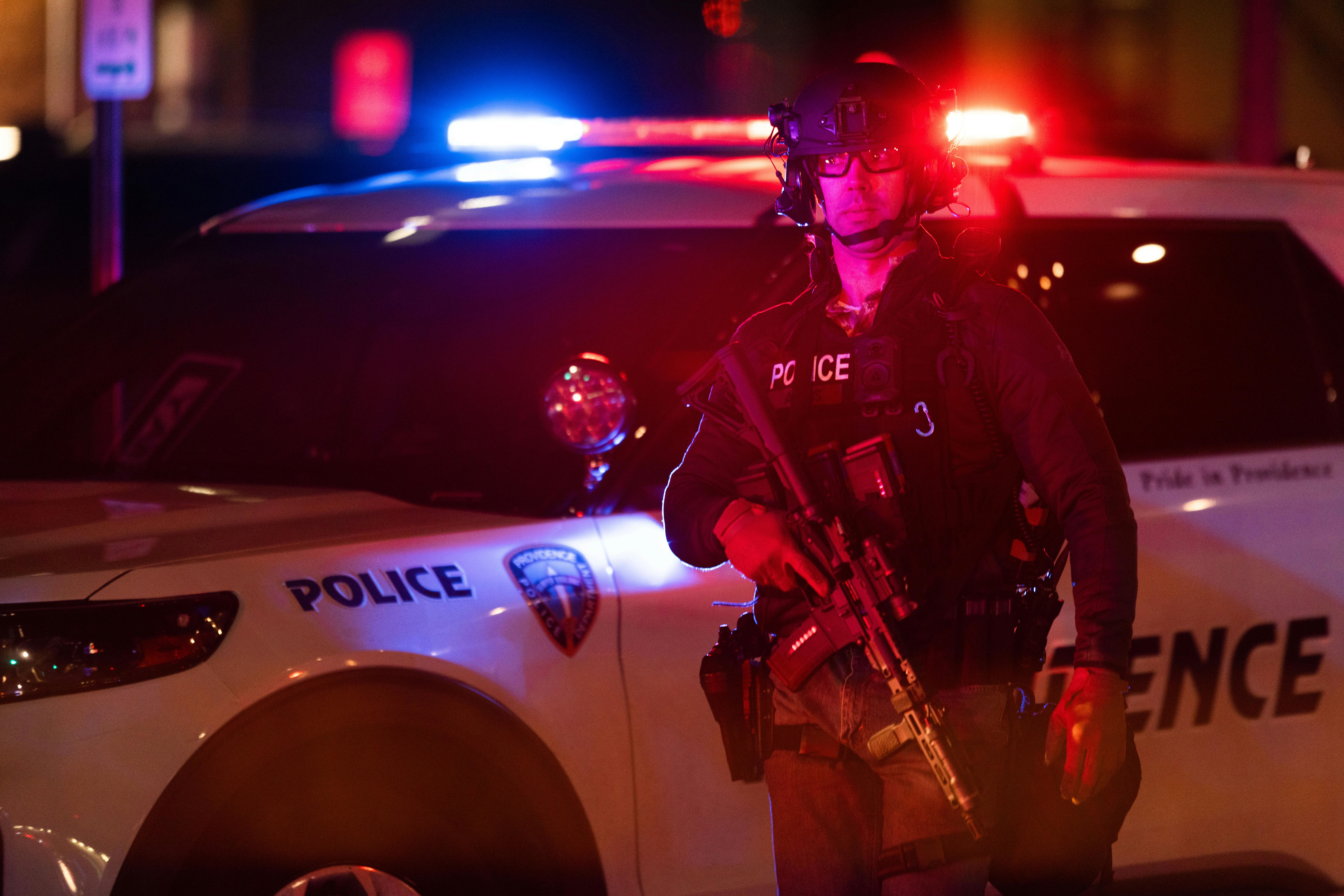 Police officers at the scene of a shooting at Brown University in Providence, Rhode Island.