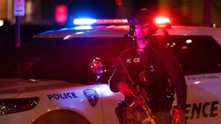 Police officers at the scene of a shooting at Brown University in Providence, Rhode Island.