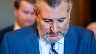 Senator Ted Cruz looks down