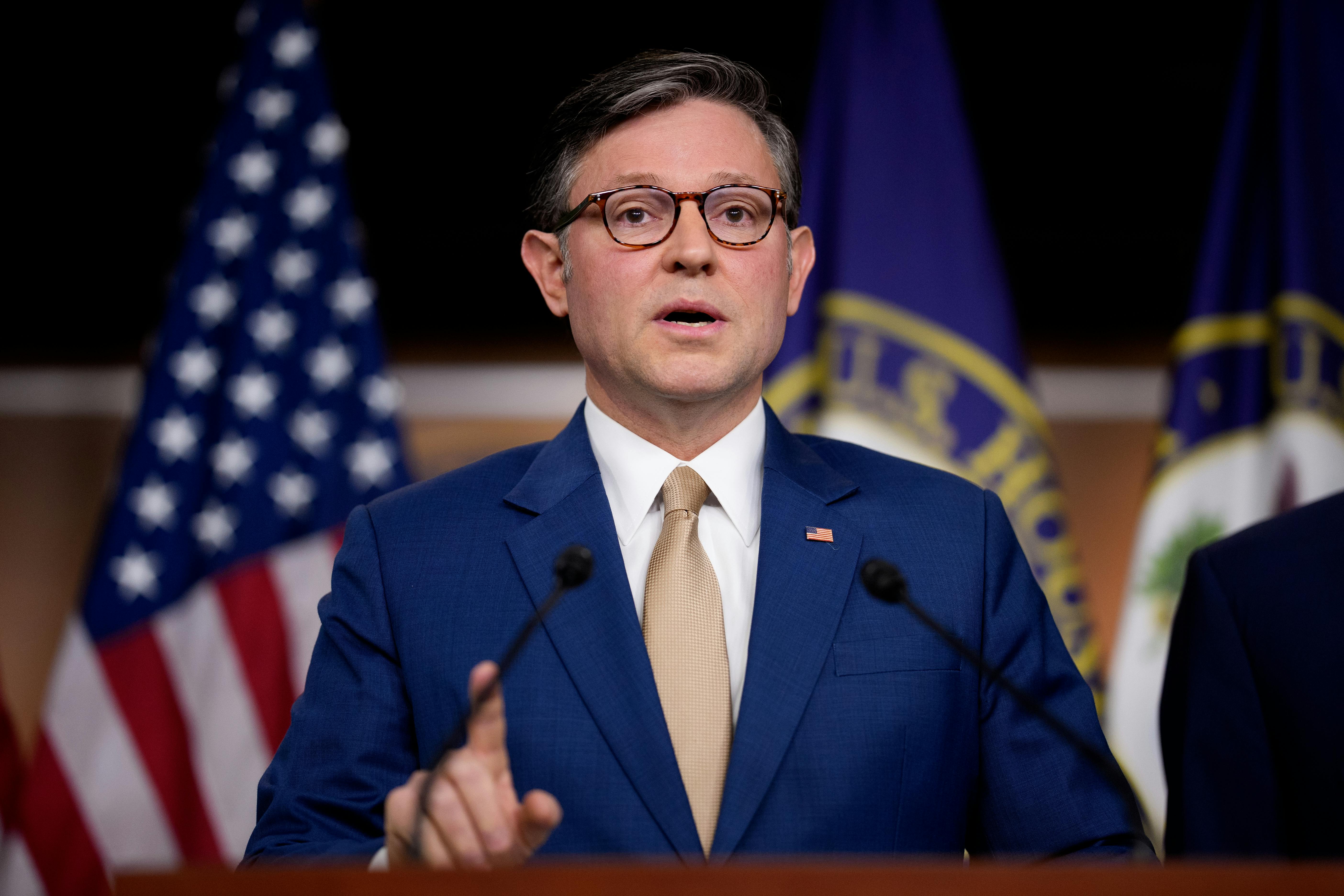 House Speaker Mike Johnson speaks at the Capitol.
