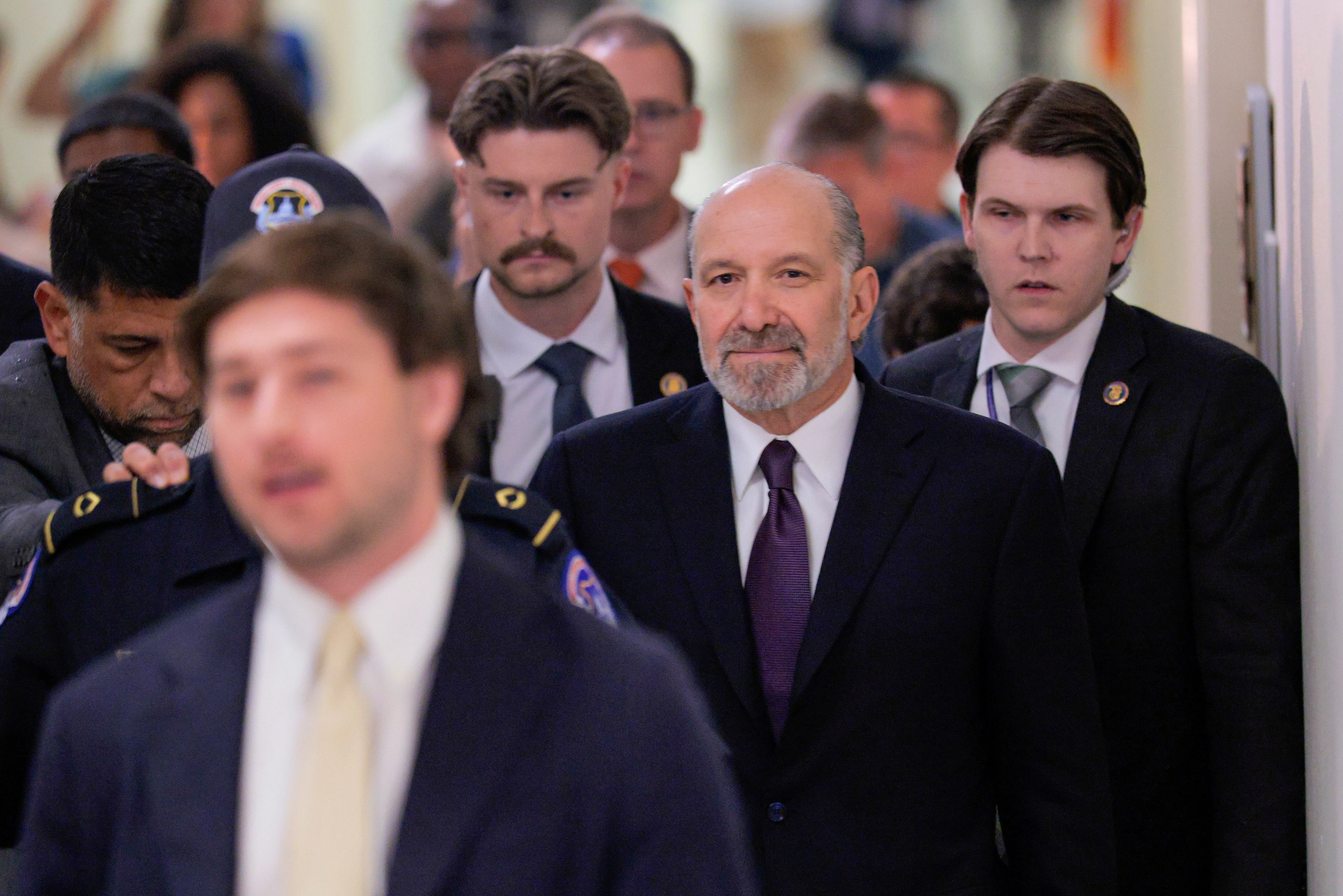 Commerce Secretary Howard Lutnick walks in a congressional building ahead of a House committee hearing on Epstein