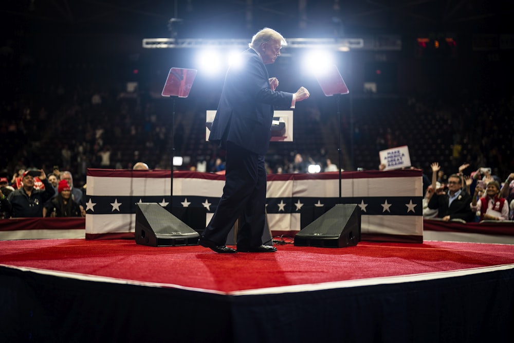 Donald Trump dances across the stage after speaking at a campaign rally held at the Winthrop Coliseum in Rock Hill, South Carolina.