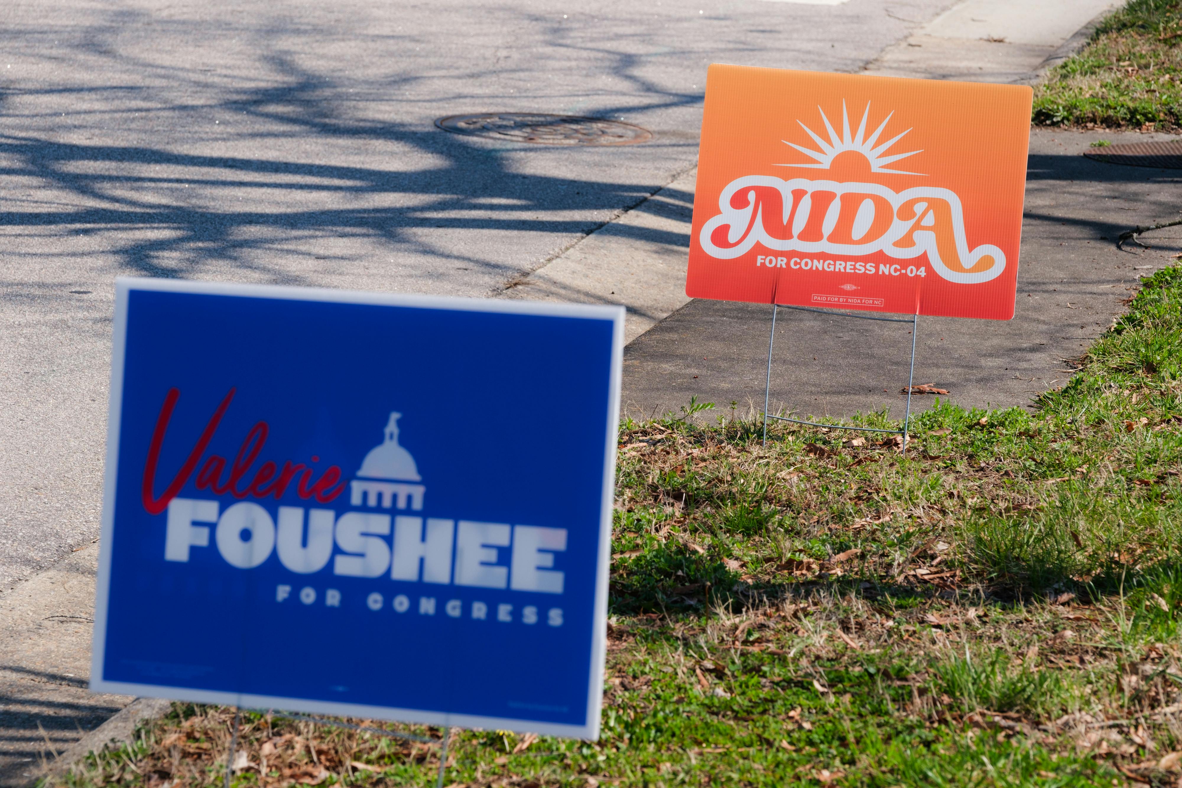 Signs for Democratic congressional primary candidates Valerie Foushee and Nida Allam in North Carolina