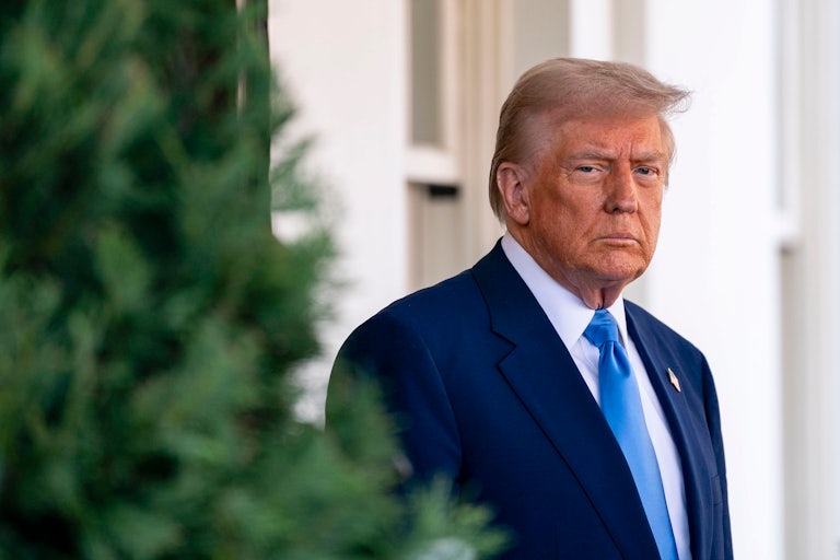 US President Donald Trump arrives to greet Emmanuel Macron, France's president, not pictured, outside the West Wing of the White House in Washington, DC, US, on Monday, Feb. 24,2025. Macron is aiming to secure US security guarantees for Ukraine, slow down Washington's talks with Russia, and demonstrate Europe's commitment to increase defense spending.