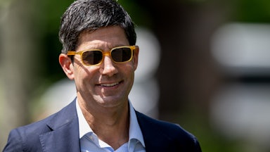 Kevin Warsh wearing sunglasses