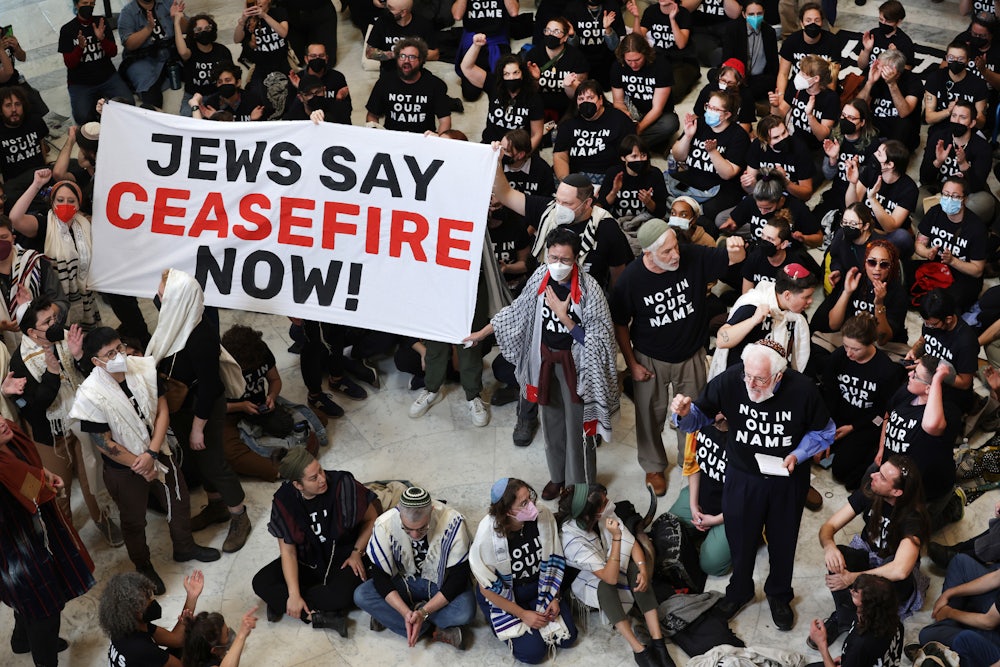 Members of Jewish Voice for Peace and IfNotNow protest in the Cannon House Office Building