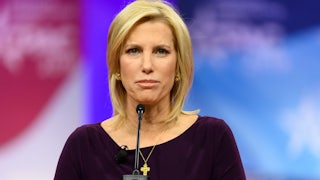 Laura Ingraham speaks at a podium