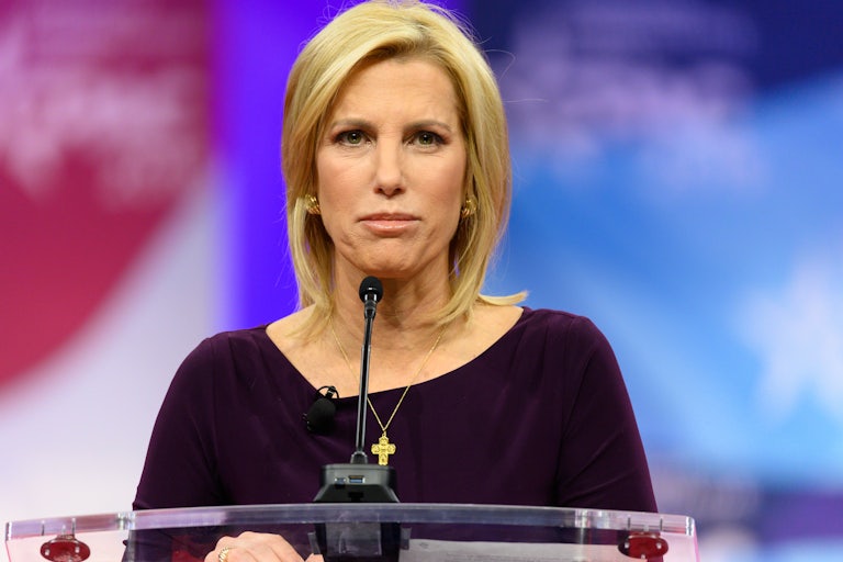 Laura Ingraham speaks at a podium