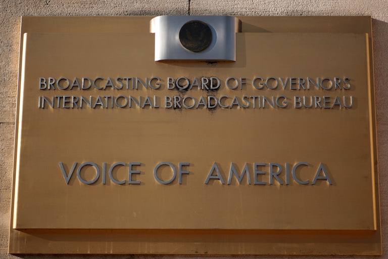 The Voice of America sign on the side of the organization's building in Washington, D.C.
