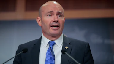 Senator Mike Lee speaks at a podium
