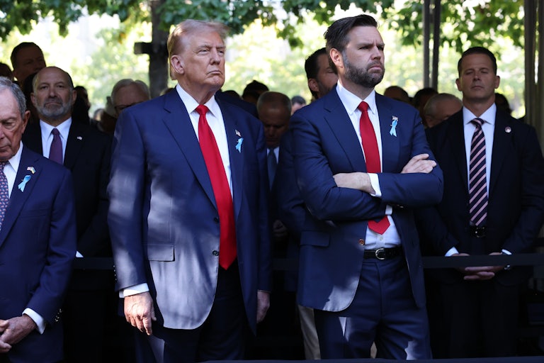 Donald Trump and J.D. Vance stand next to each other at a 9/11 memorial service