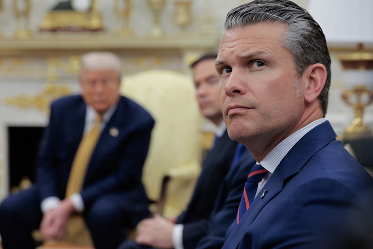 Defense Secretary Pete Hegseth sits in the Oval Office with Donald Trump and Secretary of State Marco Rubio.