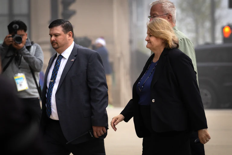 Hannah Dugan walks into court