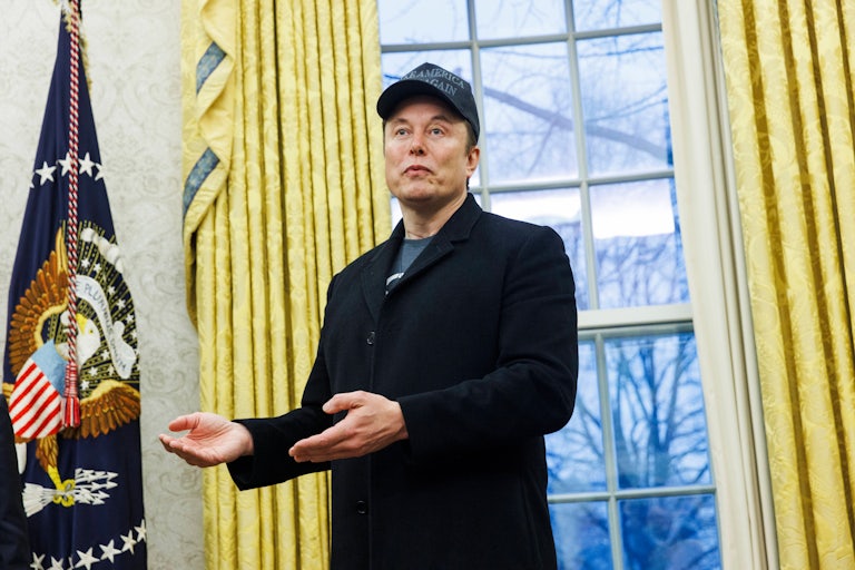 Elon Musk speaks in the Oval Office.