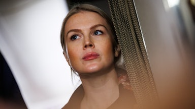 White House press secretary Karoline Leavitt looks to the side