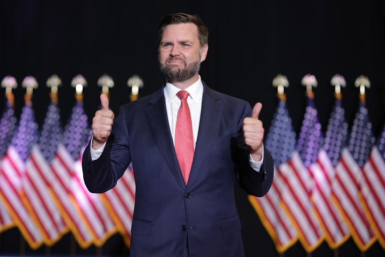 J.D. Vance gives two thumbs up at a Donald Trump rally
