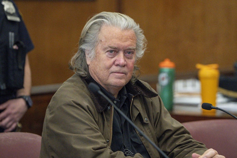 Steve Bannon sits in a courtroom