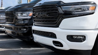 The fronts of Dodge Rams are seen in a line.