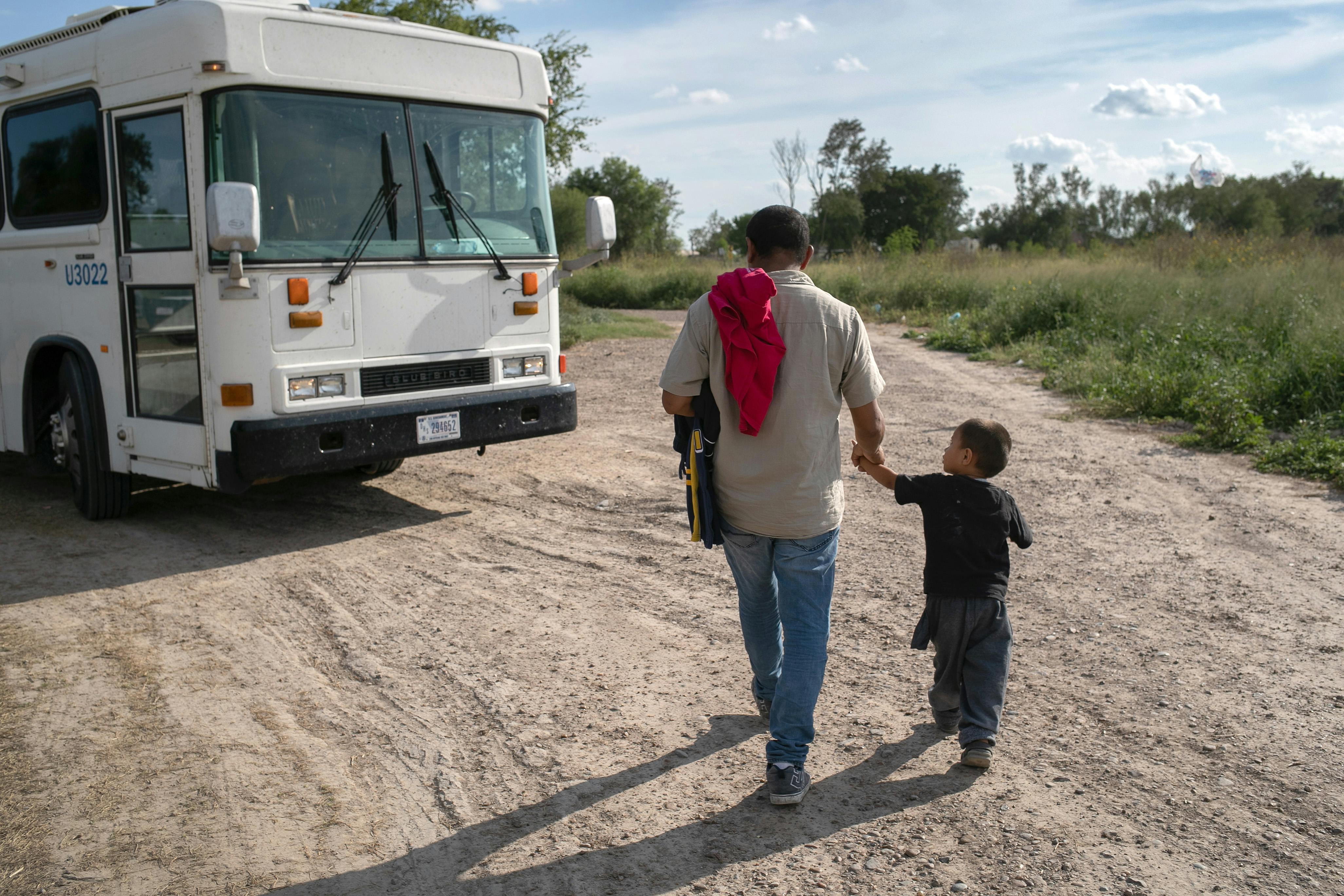 A 3 year old unaccompanied minor from Honduras waits to be bussed to a U.S. Border Patrol facility in Texas.