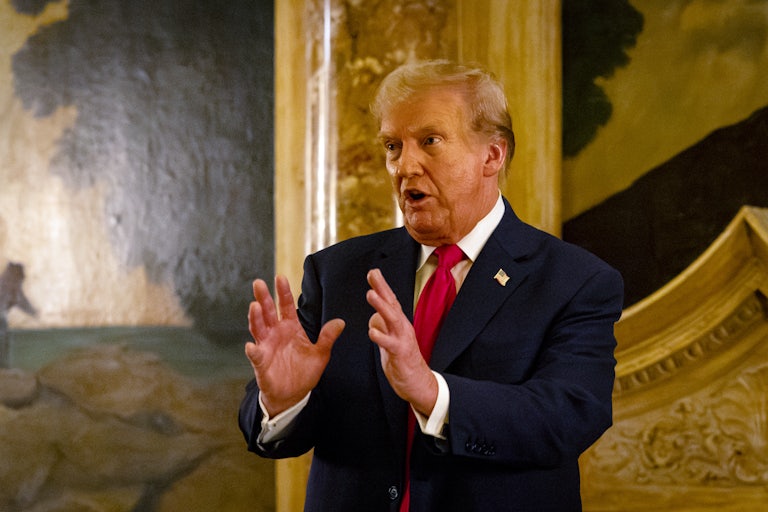 Donald Trump gestures as he speaks