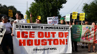 People protest against ICE’s presence in Houston after federal agents shot and killed Lorenzo Salgado Araujo.