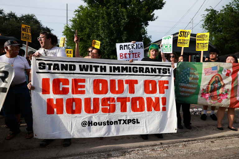 People protest against ICE’s presence in Houston after federal agents shot and killed Lorenzo Salgado Araujo.