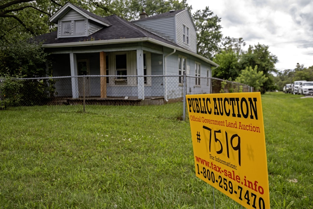 Southfield, Michigan, A sign advertises the upcoming online auction of a home foreclosed because of nonpayment of taxes.