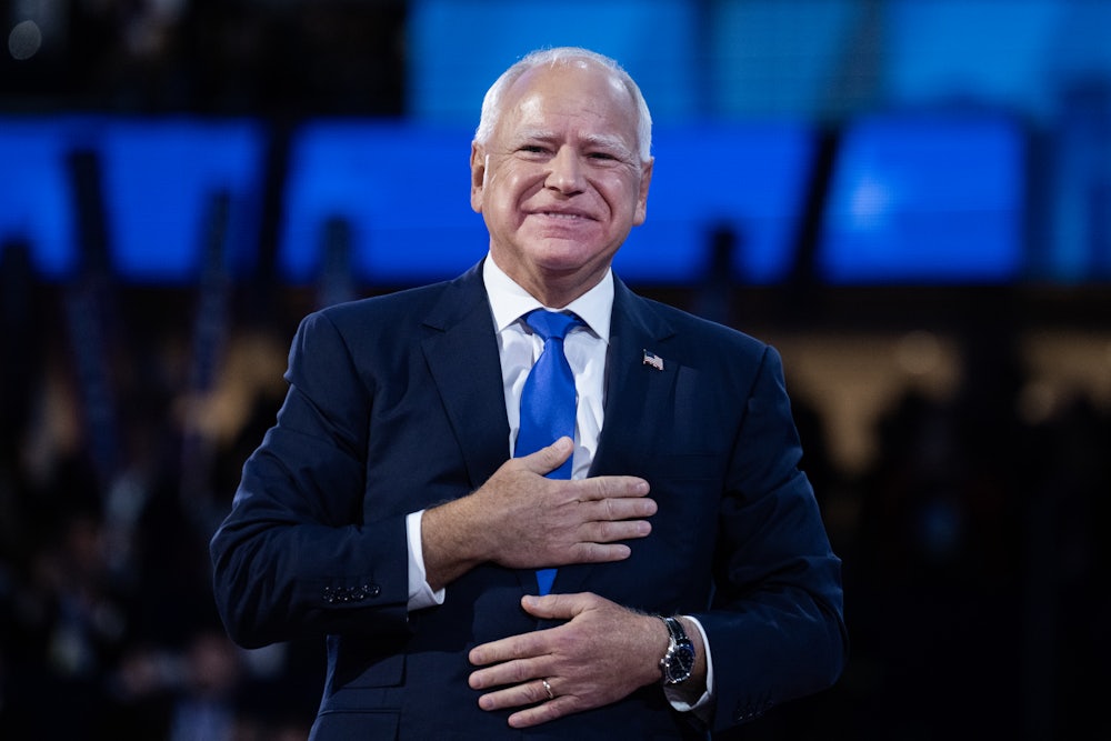 Tim Walz takes the stage to speak on the third night of the Democratic National Convention.