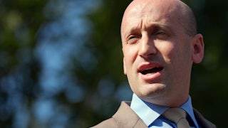 Stephen Miller speaks to reporters outside the White House